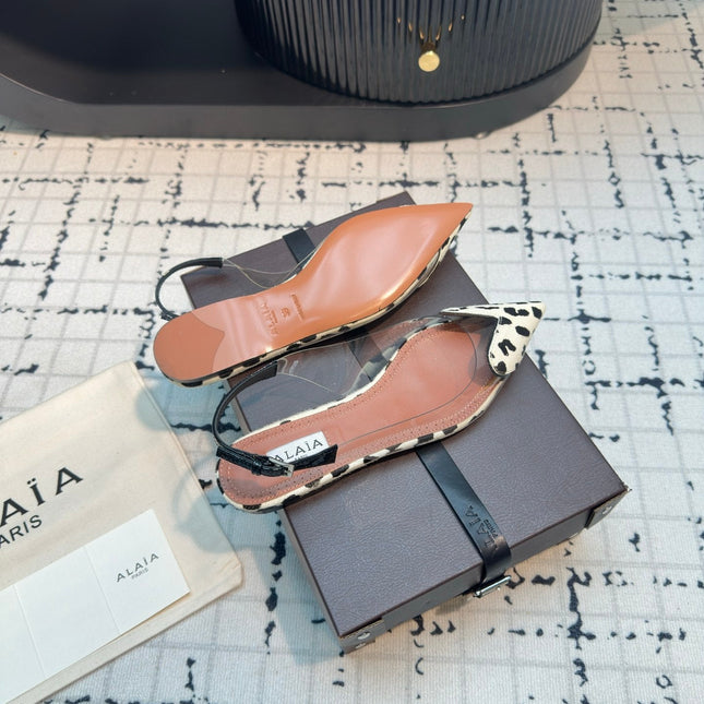 ALAIA FLAT SLINGBACK IN BLACK MIX WHITE PATENT CALFSKIN AND FILM