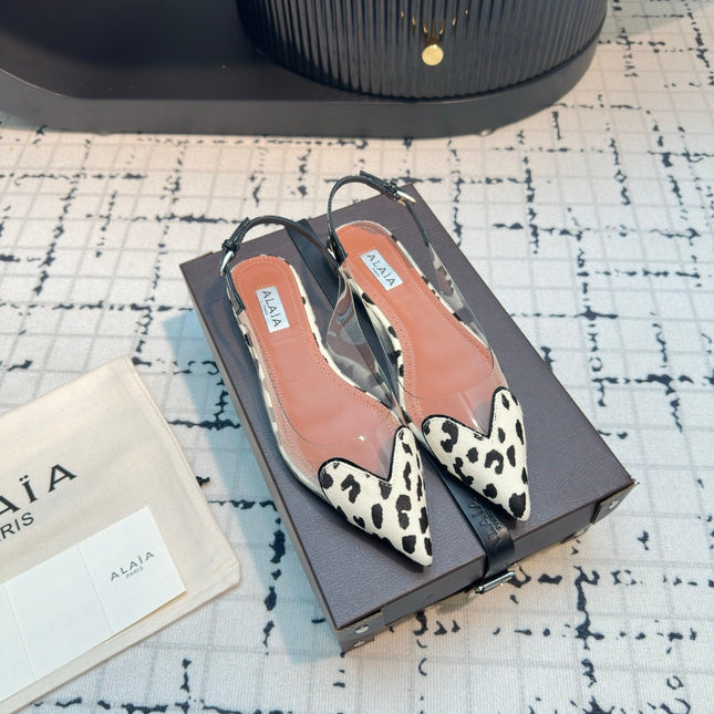 ALAIA FLAT SLINGBACK IN BLACK MIX WHITE PATENT CALFSKIN AND FILM