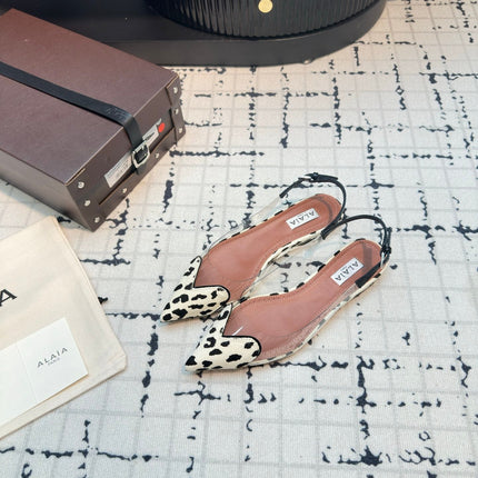 ALAIA FLAT SLINGBACK IN BLACK MIX WHITE PATENT CALFSKIN AND FILM