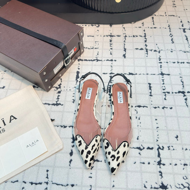 ALAIA FLAT SLINGBACK IN BLACK MIX WHITE PATENT CALFSKIN AND FILM