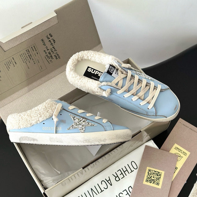 SUPER-STAR SABOTS IN BLUE CALFSKIN WITH GLITTER WHITE STAR