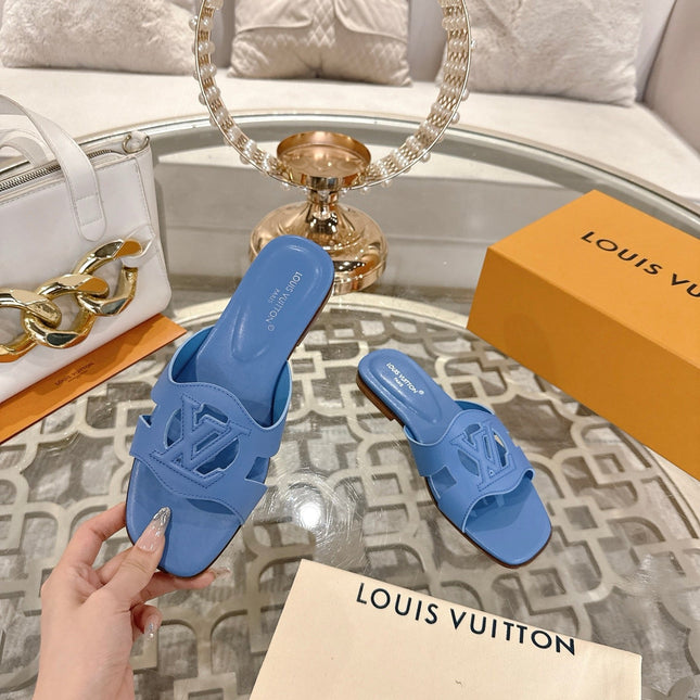 ISOLA FLAT SLIDE IN CORNFLOWER BLUE CALFSKIN