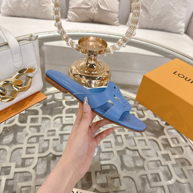 ISOLA FLAT SLIDE IN CORNFLOWER BLUE CALFSKIN