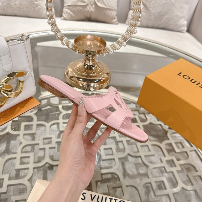 ISOLA FLAT SLIDE IN PASTEL PINK CALFSKIN