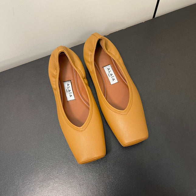 ALAIA BALLET FLATS IN COPPER BROWN SMOOTH CALFSKIN