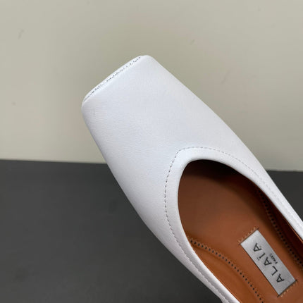 ALAIA BALLET FLATS IN WHITE SMOOTH CALFSKIN