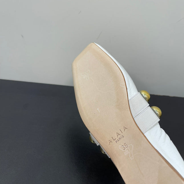 ALAIA BALLET FLATS IN WHITE GLOSSY CALFSKIN WITH GOLD HARDWARE