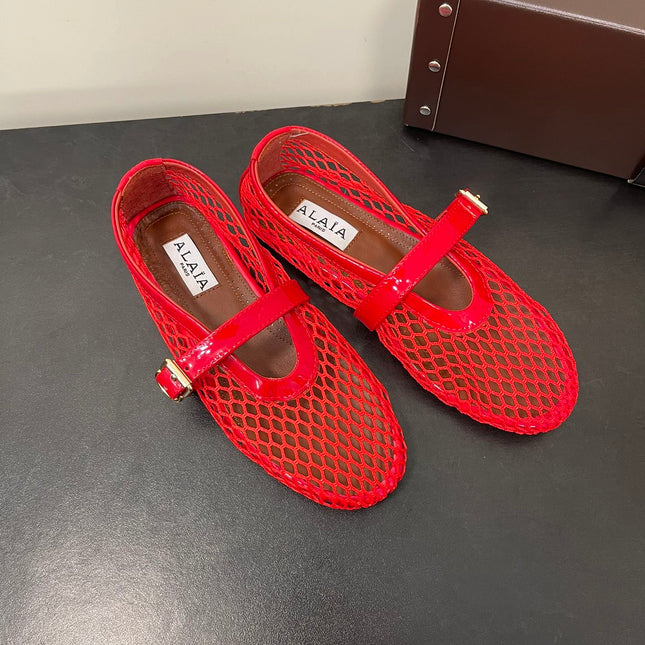 ALAIA BALLET FLATS IN CHERRY RED MESH FISHNET