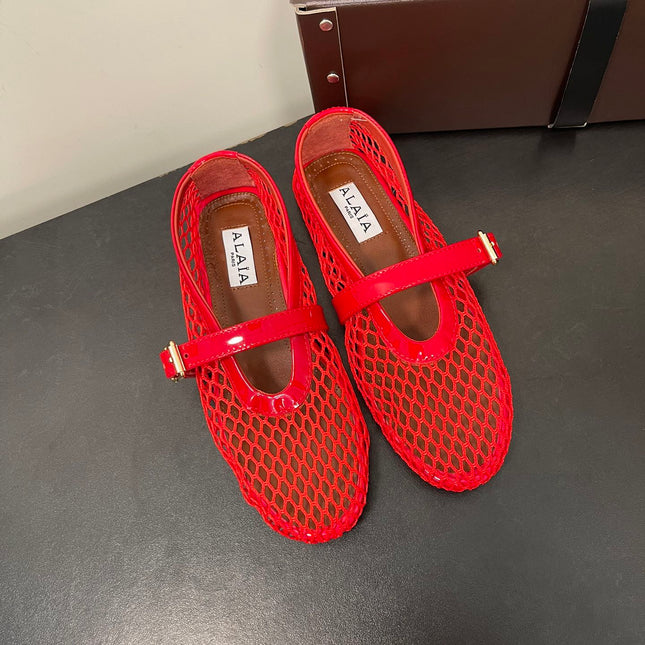 ALAIA BALLET FLATS IN CHERRY RED MESH FISHNET