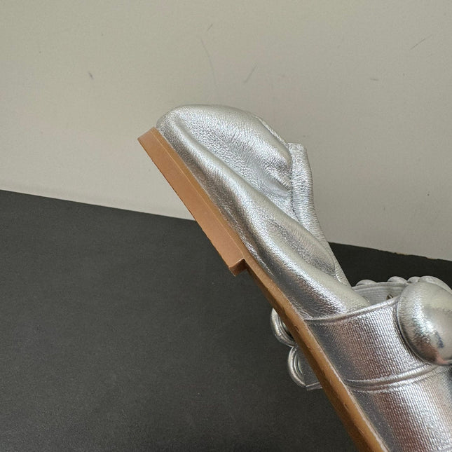 ALAIA SPHERE BALLET FLATS IN SILVER LAMBSKIN