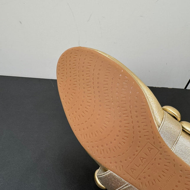 ALAIA SPHERE BALLET FLATS IN GOLDEN LAMBSKIN