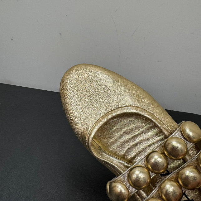 ALAIA SPHERE BALLET FLATS IN GOLDEN LAMBSKIN