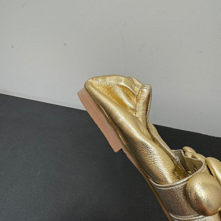 ALAIA SPHERE BALLET FLATS IN GOLDEN LAMBSKIN