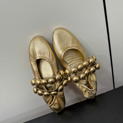 ALAIA SPHERE BALLET FLATS IN GOLDEN LAMBSKIN