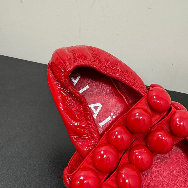 ALAIA SPHERE BALLET FLATS IN CHERRY RED LAMBSKIN