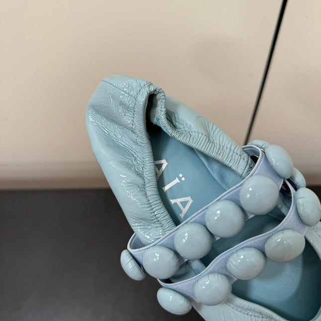 ALAIA SPHERE BALLET FLATS IN LIGHT BLUE LAMBSKIN