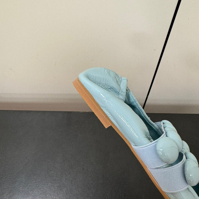 ALAIA SPHERE BALLET FLATS IN LIGHT BLUE LAMBSKIN