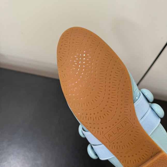 ALAIA SPHERE BALLET FLATS IN LIGHT BLUE LAMBSKIN