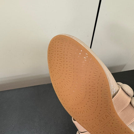 ALAIA SPHERE BALLET FLATS IN ALMOND BEIGE LAMBSKIN