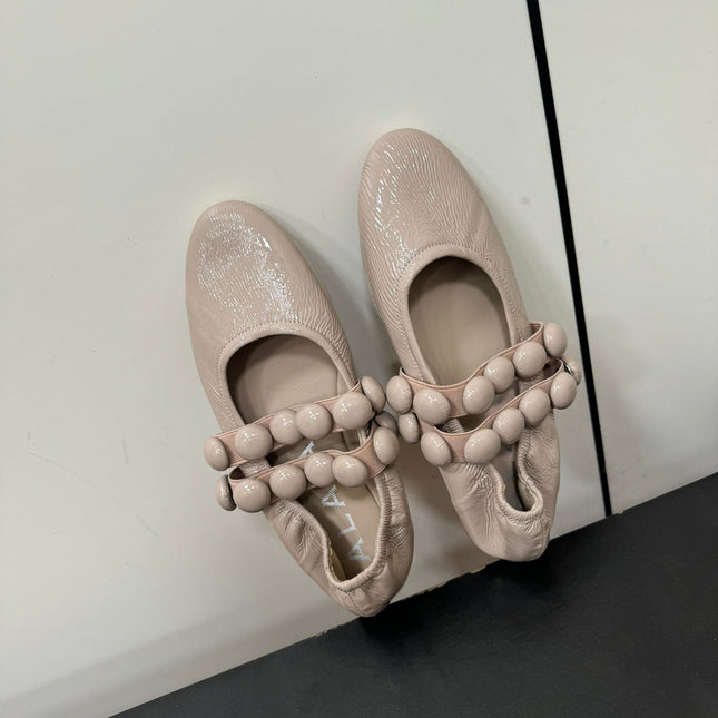 ALAIA SPHERE BALLET FLATS IN ALMOND BEIGE LAMBSKIN