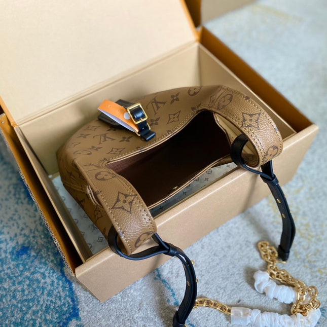 ATLANTIS BB 17 IN BROWN MONOGRAM REVERSE CANVAS