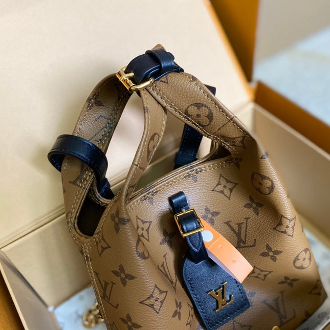 ATLANTIS BB 17 IN BROWN MONOGRAM REVERSE CANVAS