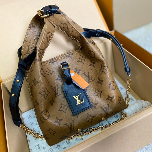 ATLANTIS BB 17 IN BROWN MONOGRAM REVERSE CANVAS