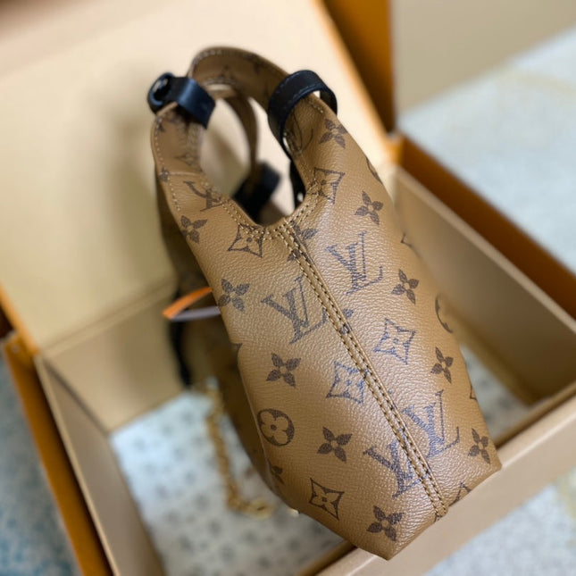 ATLANTIS BB 17 IN BROWN MONOGRAM REVERSE CANVAS