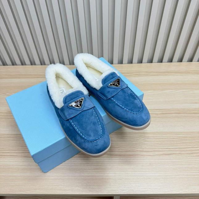 LOAFER IN AZURE BLUE SUEDE AND FUR LINING ATTACHED TRIANGLE LOGO