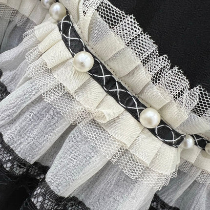 DIOR BLACK RUFFLED SKIRT WITH PEARL EMBELLISHMENTS