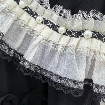 DIOR BLACK RUFFLED SKIRT WITH PEARL EMBELLISHMENTS