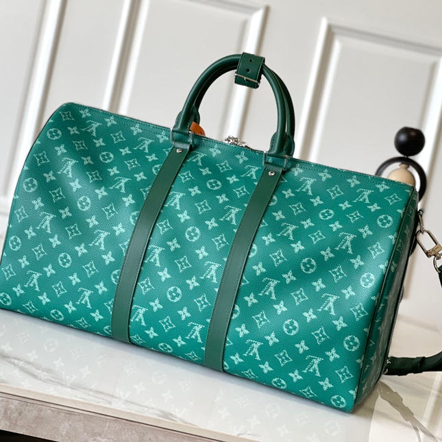 KEEPALL BANDOULIÈRE 50 IN GREEN MONOGRAM HERITAGE CANVAS