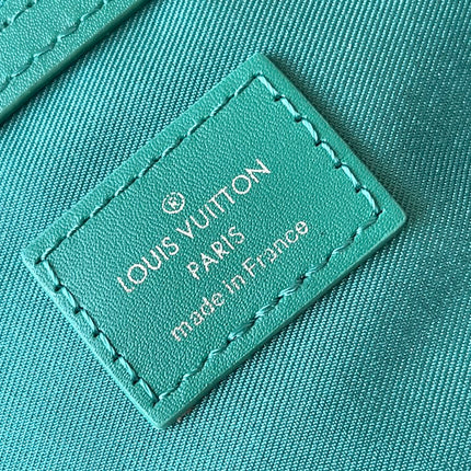 KEEPALL BANDOULIÈRE 50 IN GREEN MONOGRAM HERITAGE CANVAS