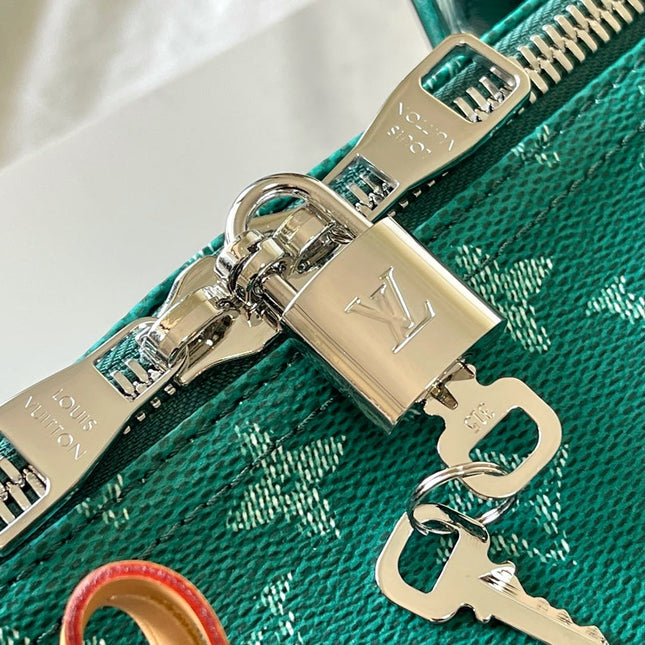 KEEPALL BANDOULIÈRE 50 IN GREEN MONOGRAM HERITAGE CANVAS