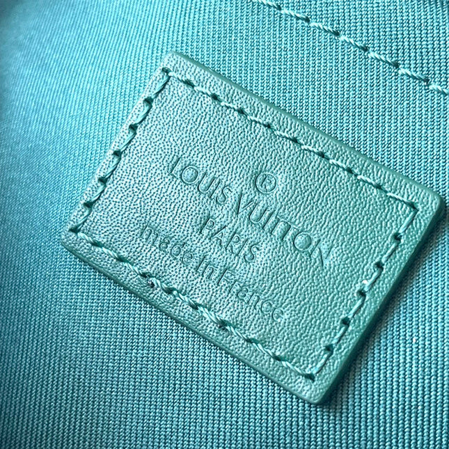 KEEPALL BANDOULIÈRE 25 IN GREEN MONOGRAM HERITAGE CANVAS