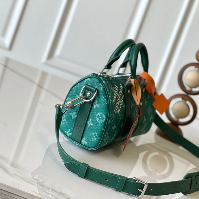 KEEPALL BANDOULIÈRE 25 IN GREEN MONOGRAM HERITAGE CANVAS