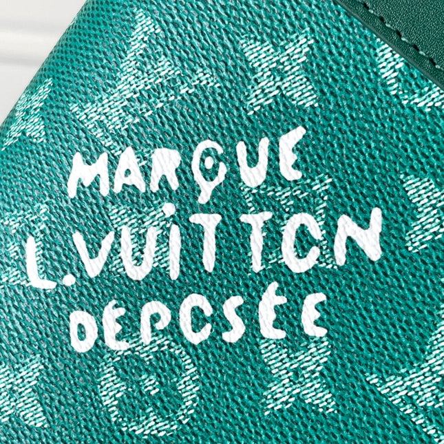 POCHETTE VOYAGE SOUPLE 32 IN GREEN MONOGRAM HERITAGE CANVAS