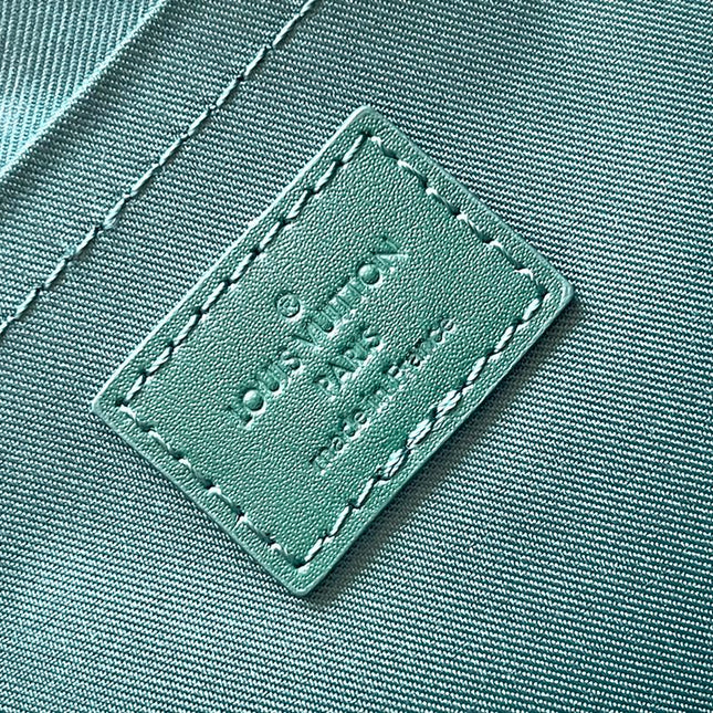 POCHETTE VOYAGE SOUPLE 32 IN GREEN MONOGRAM HERITAGE CANVAS