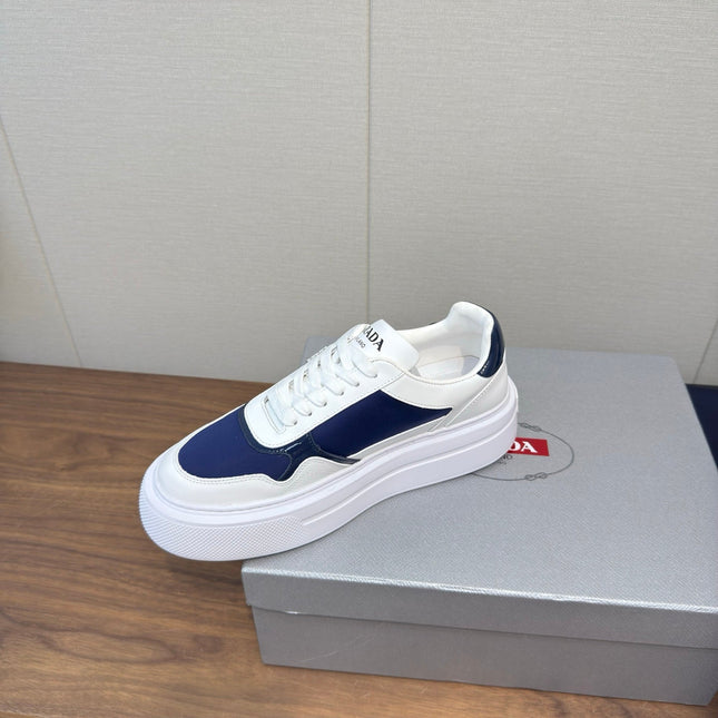 PRADA 25S DOWNTOWN BOLD SNEAKERS 45MM IN WHITE AND NAVY BLUE CALFSKIN