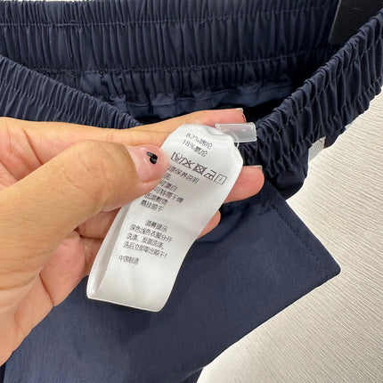 MIUMIU HIGH-WAISTED WIDE-LEG PANTS WITH BOW 276652