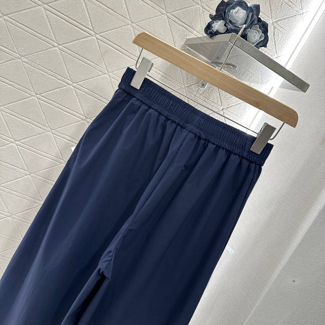 MIUMIU HIGH-WAISTED WIDE-LEG PANTS WITH BOW 276652