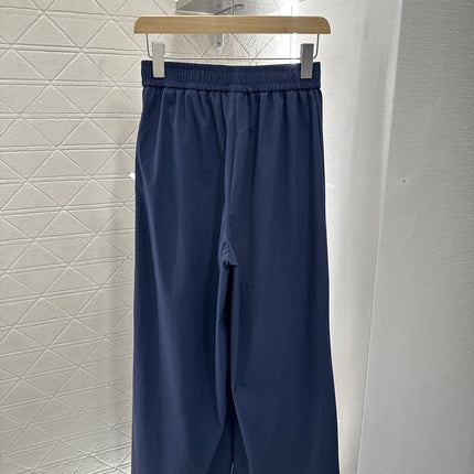MIUMIU HIGH-WAISTED WIDE-LEG PANTS WITH BOW 276652