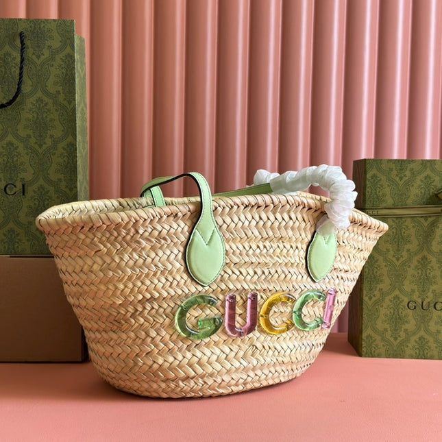 SMALL TOTE BAG 26 WITH LOGO IN NATURAL-COLORED STRAW AND LIGHT GREEN CALFSKIN HANDLE