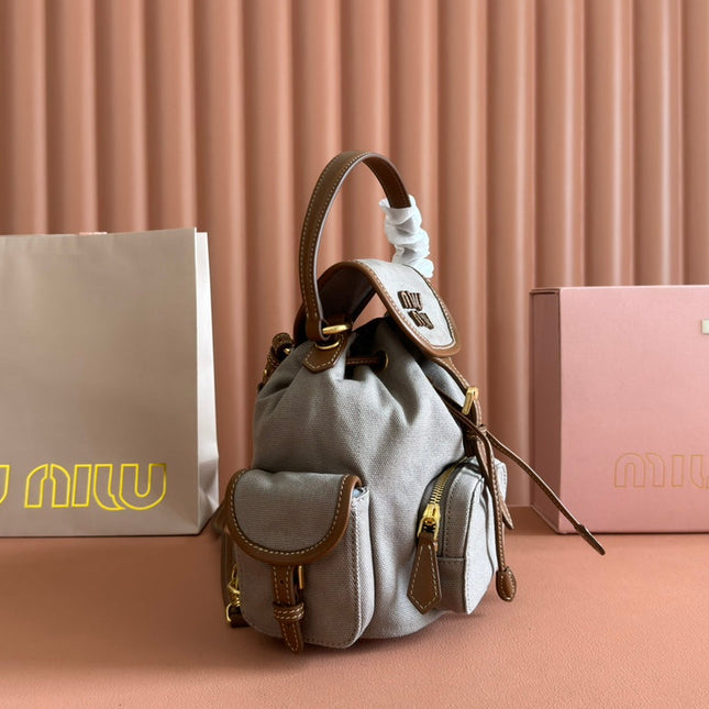 BACKPACK 22 IN GREY CANVAS BROWN CALFSKIN