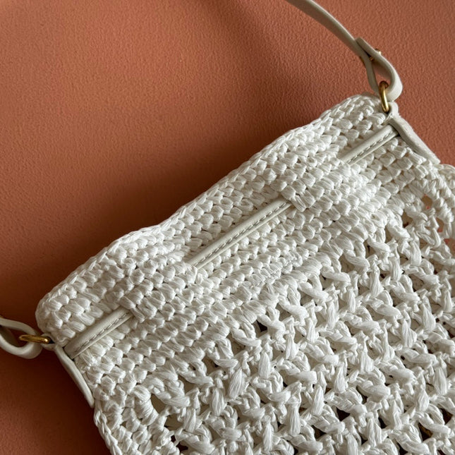 WANDER BUCKET BAG 23 WHITE IN RAFFIA WITH LEATHER TRIM