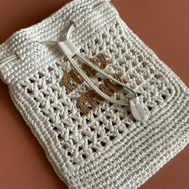 WANDER BUCKET BAG 23 WHITE IN RAFFIA WITH LEATHER TRIM