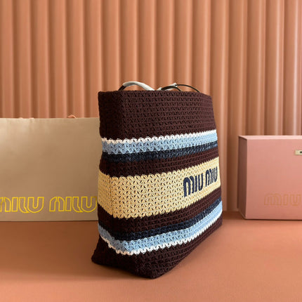 TOTE BAG 40 IN STRIPED PATTERN OF BROWN BLUE AND YELLOW WOVEN RAFFIA