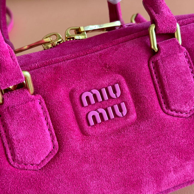 ARCADIE BAG 22 IN FUCHSIA SUEDE GOLD HARDWARE