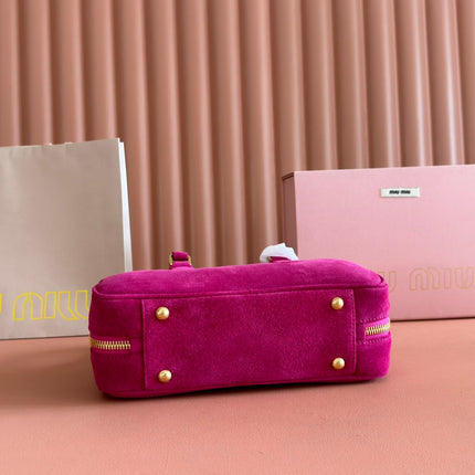 ARCADIE BAG 27 IN FUCHSIA SUEDE GOLD HARDWARE
