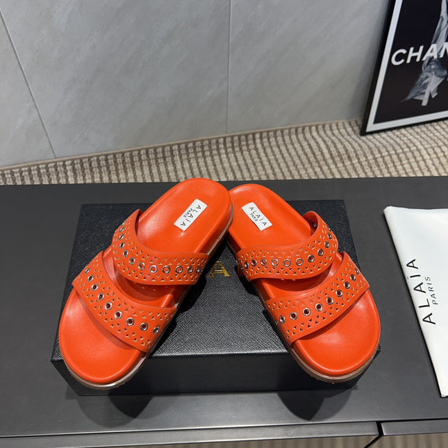 ALAIA DOUBLE-STRAP SANDALS 25S IN ORANGE CALFSKIN